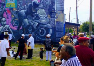 tiny travel chick new orleans mural second line