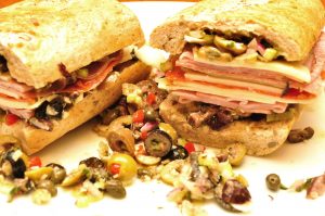 tiny travel chick new orleans muffuletta