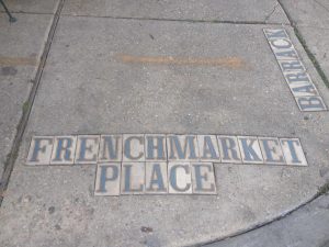 tiny travel chick new orleans french market place sign