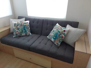 tiny travel chick travel experience tiny house couch 