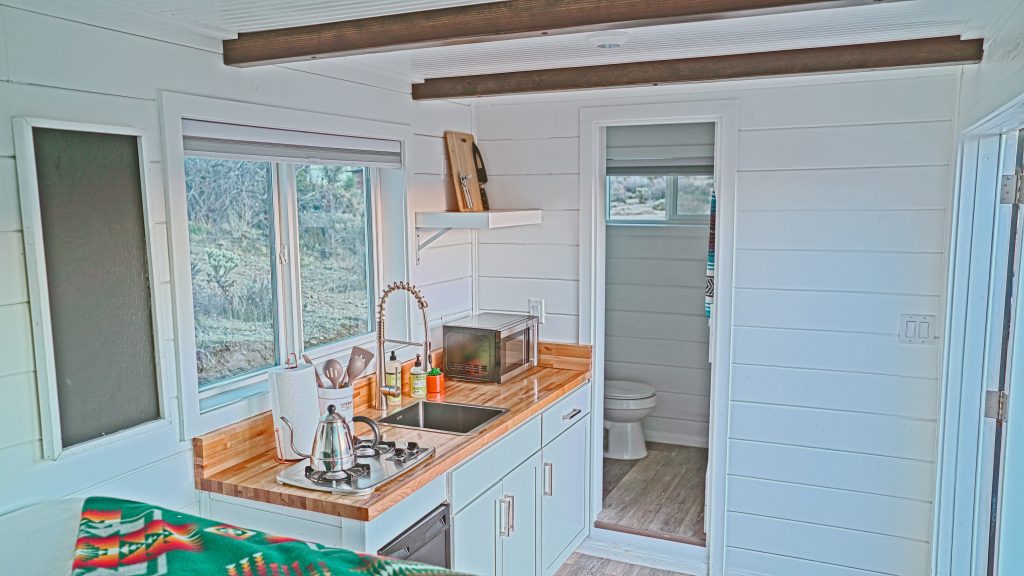 tiny travel chick shipping container cost alternative living spaces tiny house kitchen 