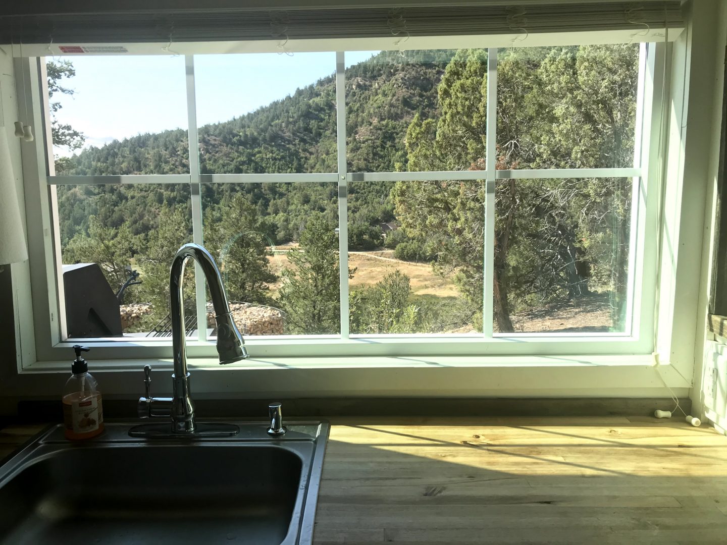 tiny travel chick tiny airbnb kitchen view